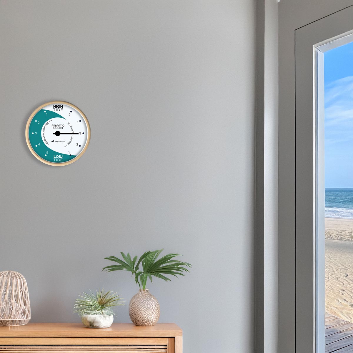 Tidal Timepieces Aqua Horizon tide clock in an entryway of a coastal home.