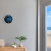 Tidal Timepieces Midnight Wave tide clock in an entryway of a coastal home.