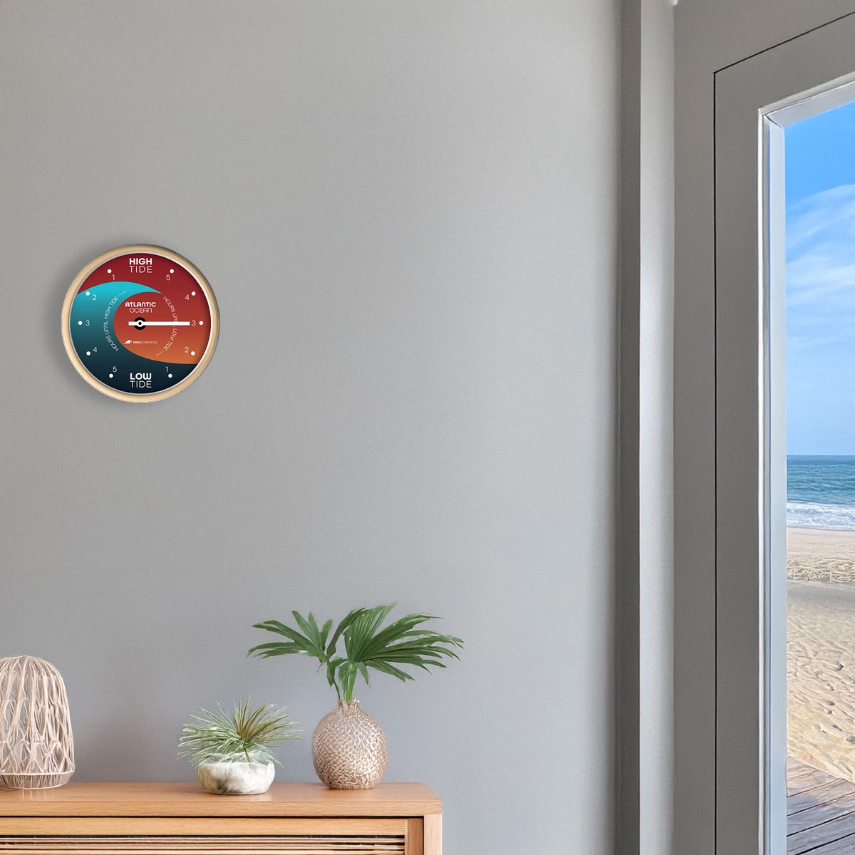 Tidal Timepieces Solstice Crest tide clock in an entryway of a coastal home.