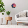 The Tidal Timepiece's Oceanic Sunrise tide clock hanging in a mid-century modern designed room.